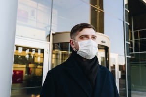 business man wearing mask